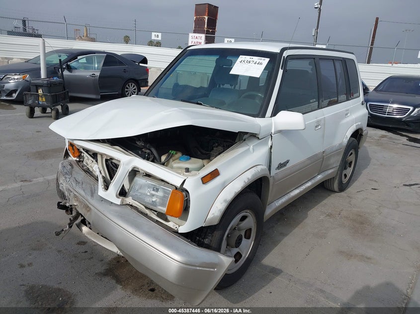 1996 SUZUKI SIDEKICK SPORT UTILITY VEHICLE 1.8L I4 FI DOHC 16V F4