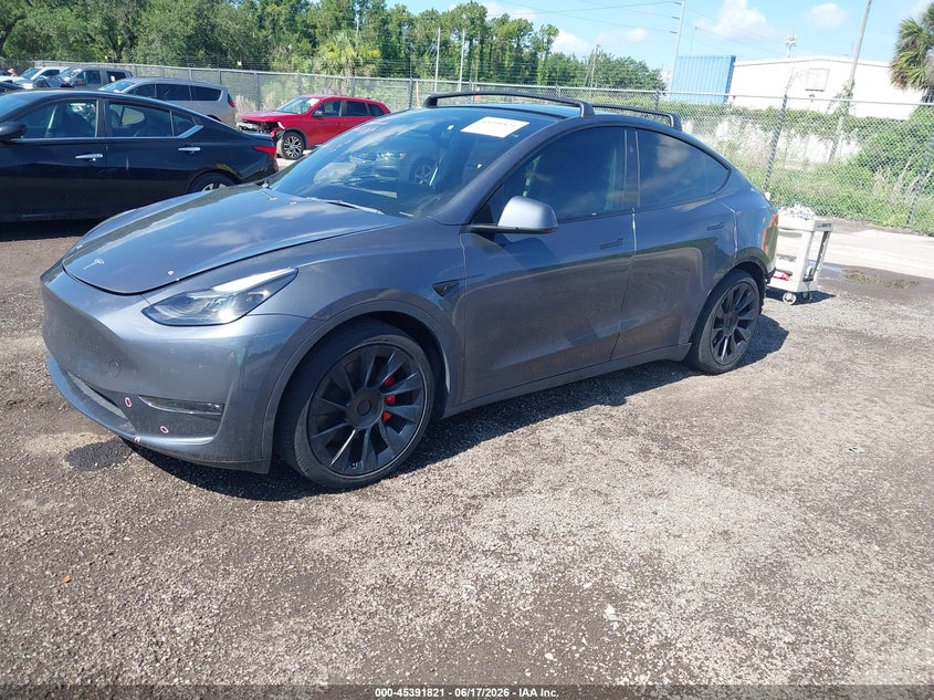 2023 Tesla Model Y Performance Dual Motor All-Wheel Drive 7SAYGDEF6PF839250 photo 1