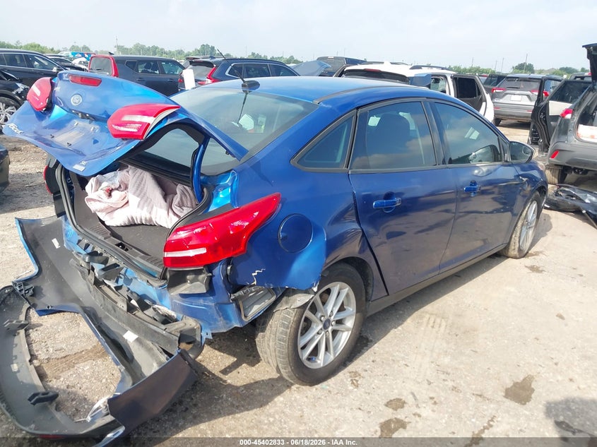 VIN 1FADP3FE8JL319654 2018 FORD FOCUS SE
