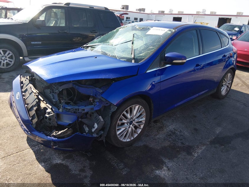 2015 Ford Focus Titanium 1FADP3N29FL341452 photo 1