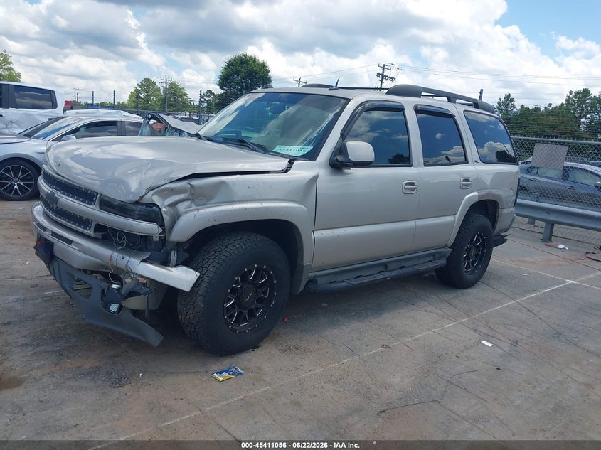 2004 Chevrolet Tahoe Z71, Left Front, IAAI, VIN 1GNEK13Z04R309007 — photo 2