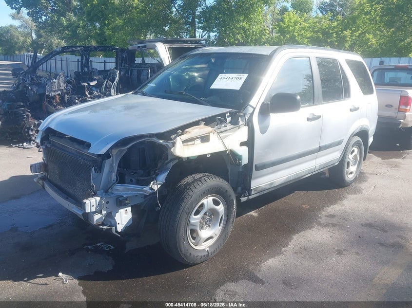 JHLRD784X2C088085 2002 Honda Cr-V Lx photo 1