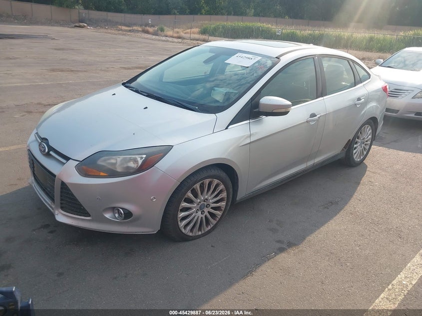 2012 Ford Focus Titanium 1FAHP3J21CL133049 photo 1