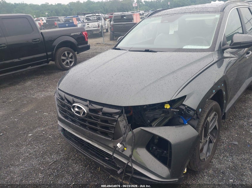 2024 HYUNDAI TUCSON HYBRID auction photo 6