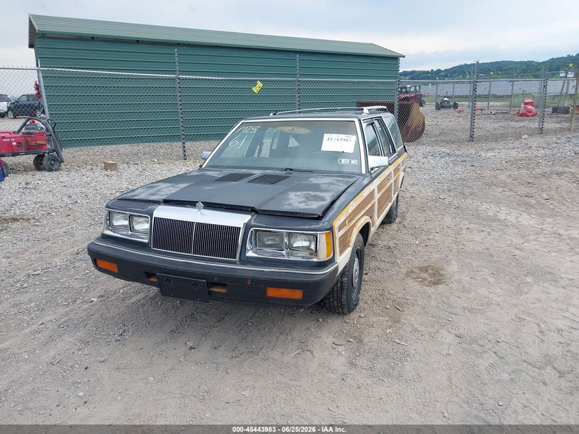1C3BC59E4GF104305 1986 CHRYSLER LEBARON TOWN AND COUNTRY photo 1