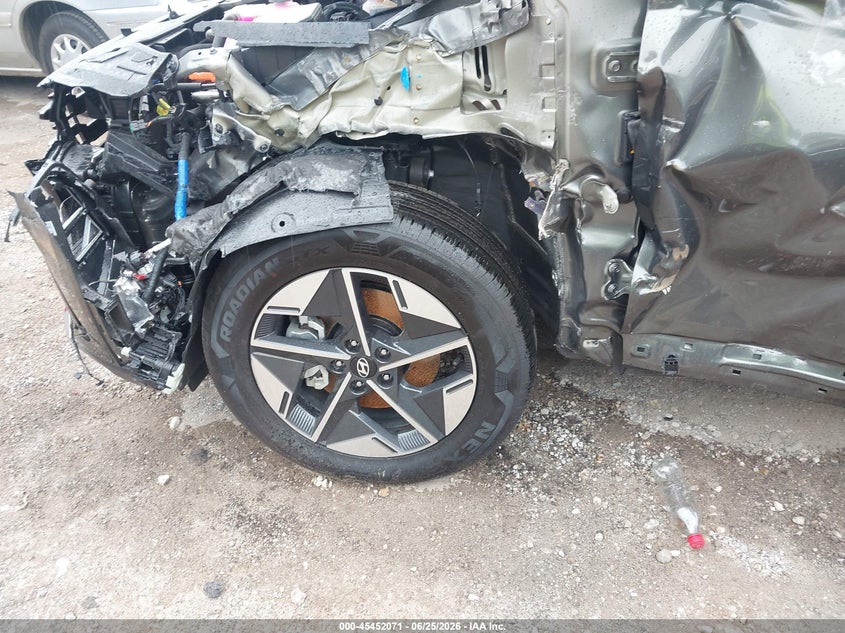 2026 HYUNDAI TUCSON HYBRID auction photo 6