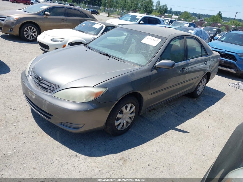 2002 Toyota Camry Le JTDBE32K720060824 photo 1