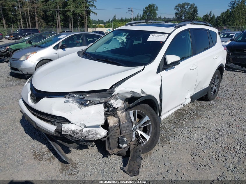 2018 Toyota RAV 4, Left Front, IAAI, VIN 2T3RFREV5JW739425 — photo 2