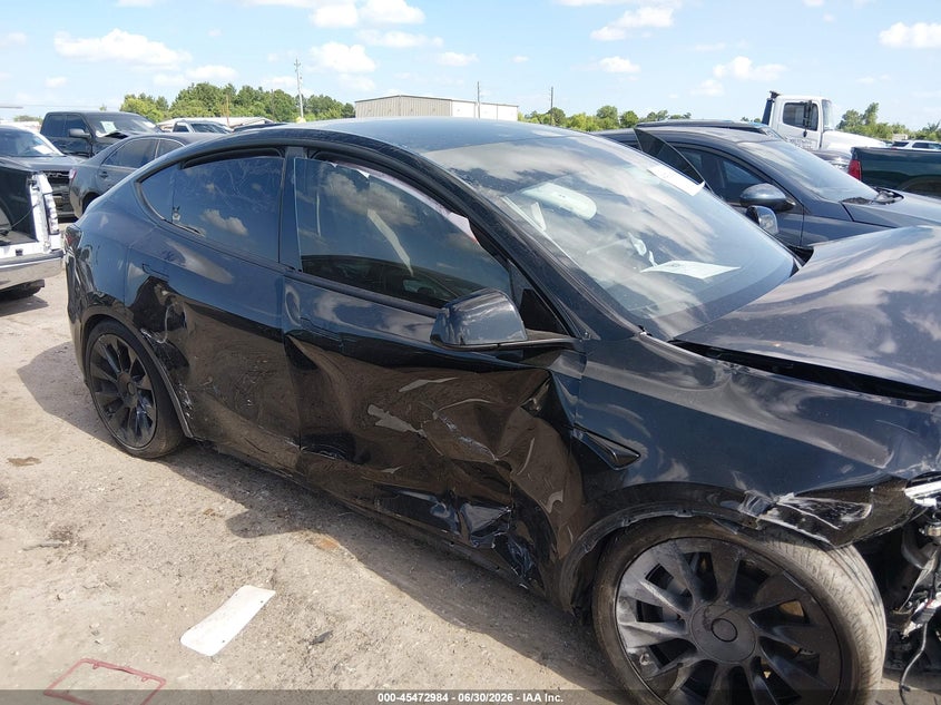 2024 Tesla Model Y Long Range Dual Motor All-Wheel Drive VIN: 7SAYGAEE7RF092041 Lot: 45472984