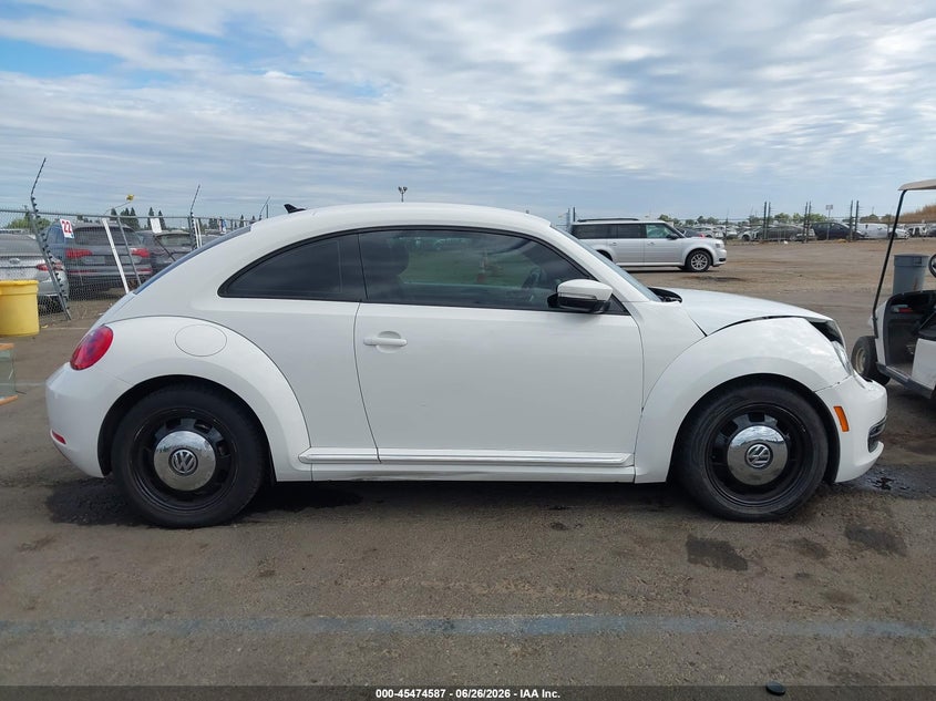 2014 Volkswagen Beetle 2.5L VIN: 3VWJP7ATXEM608904 Lot: 45474587