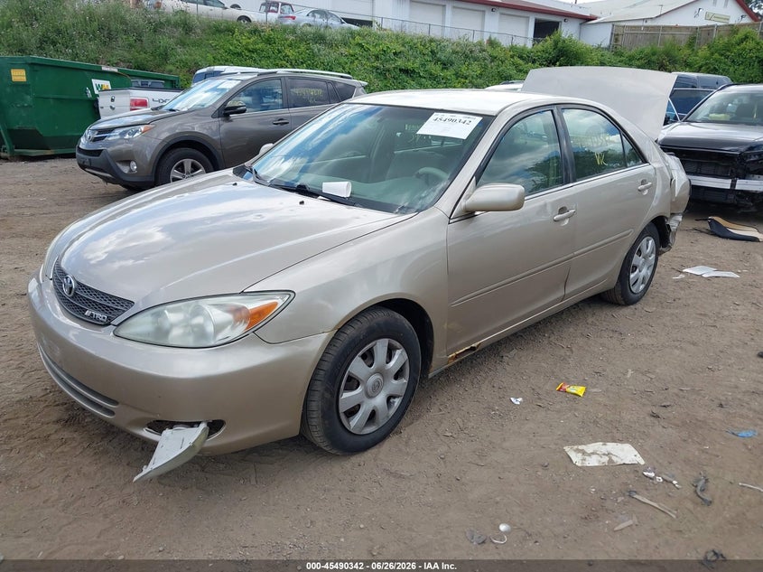 2003 Toyota Camry Le JTDBE32KX30203699 photo 1