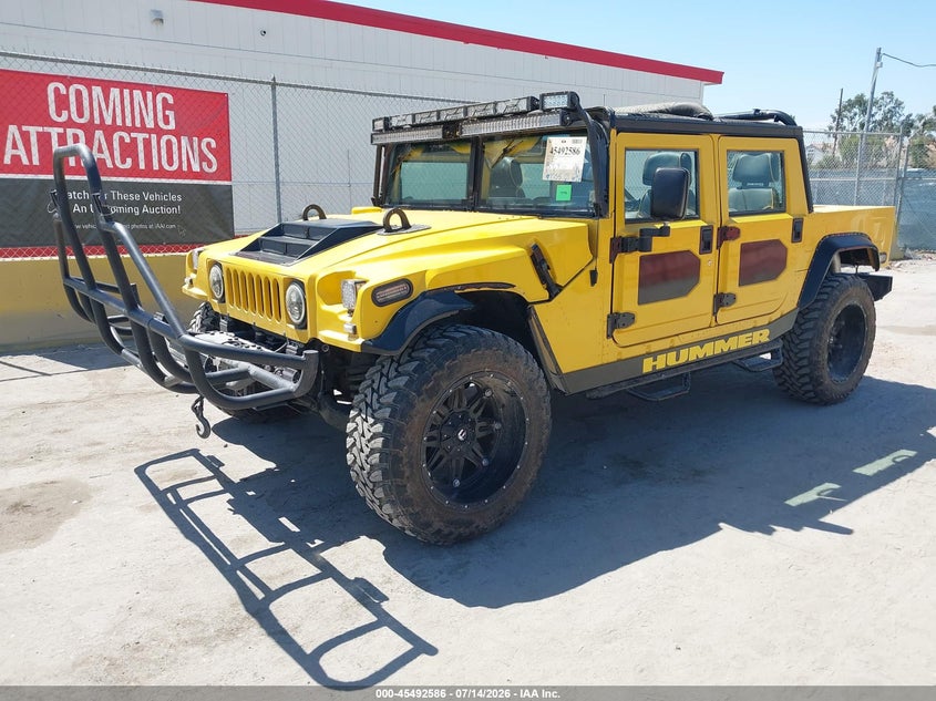 137ZA9032YE190565 2000 Am General Hummer Open Top photo 1