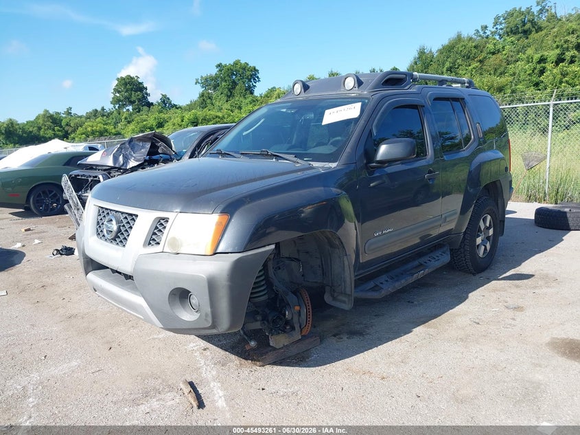 2010 Nissan Xterra Off Road, Левый бок, IAAI, VIN 5N1AN0NW2AC501440 — фото 2