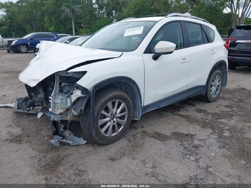 2015 Mazda Cx-5 Sport JM3KE2BE3F0444634 photo 1