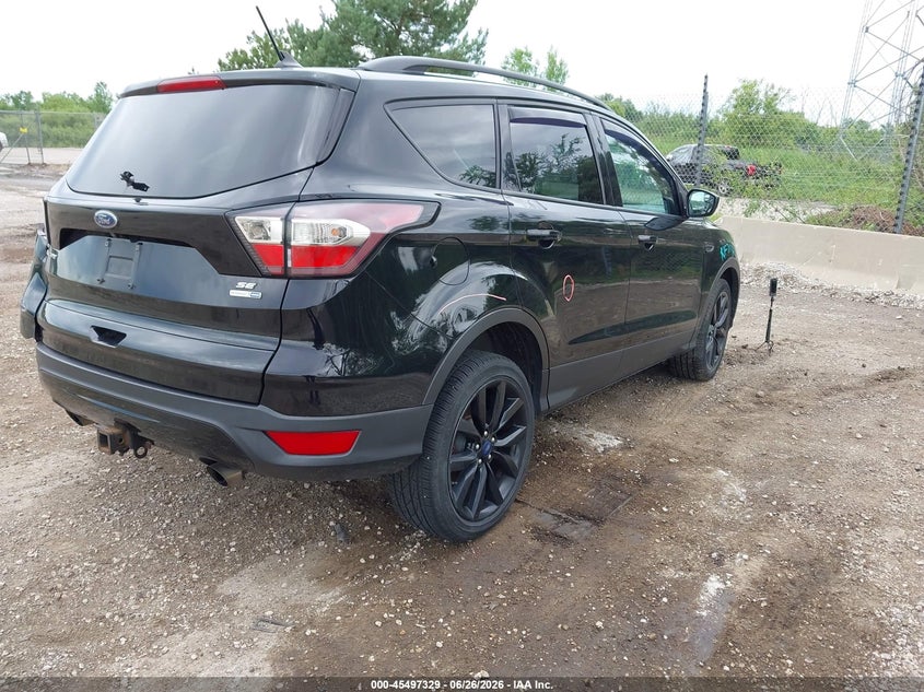 VIN 1FMCU9GD2JUA18584 2018 FORD ESCAPE SE