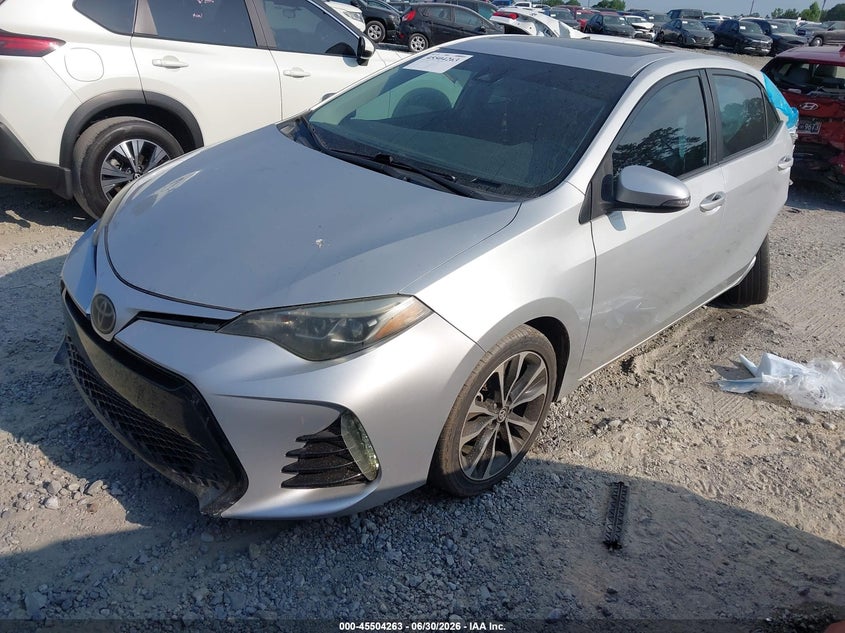 2018 Toyota Corolla, Левый зад, IAAI, VIN 5YFBURHE8JP751923 — фото 2