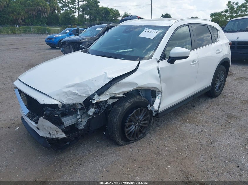 2021 Mazda CX-5, Left Front, IAAI, VIN JM3KFBCM0M1430197 — photo 2