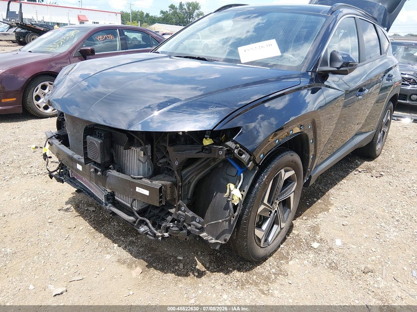 2023 HYUNDAI TUCSON HYBRID auction photo 6