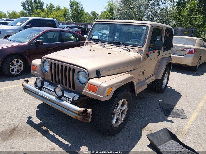 2000 Jeep Wrangler, Normal Wear & Tear, IAAI, VIN 1J4FA59S4YP749311 — photo 2