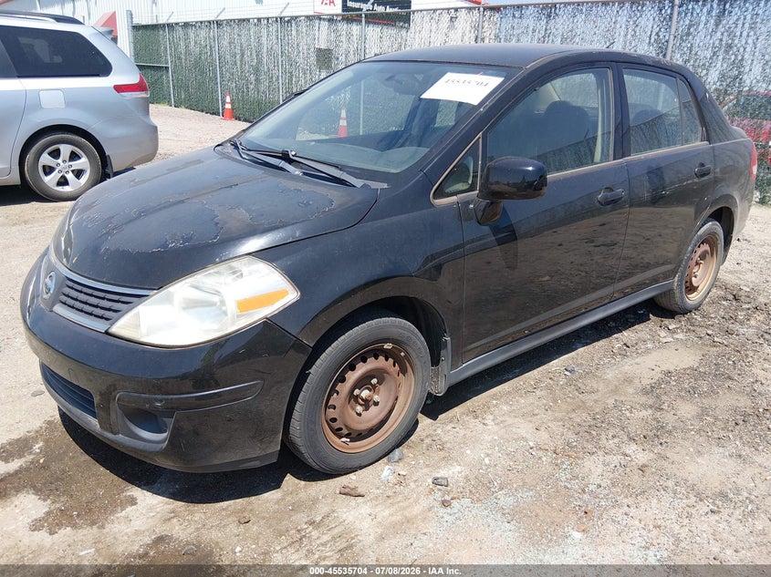 3N1BC11E29L412004 2009 Nissan Versa 1.8s photo 1
