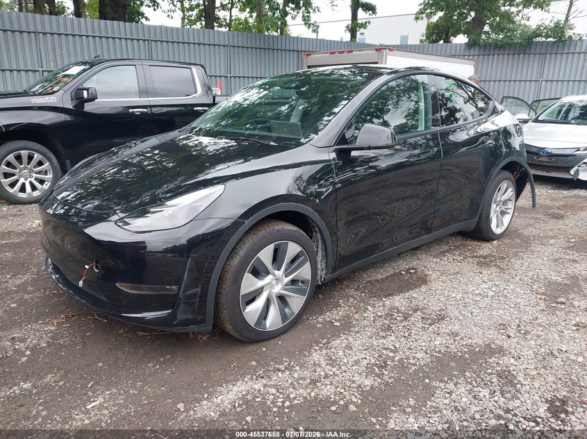 2023 Tesla Model Y, Удар сзади, IAAI, VIN 7SAYGDEE8PF978707 — фото 2