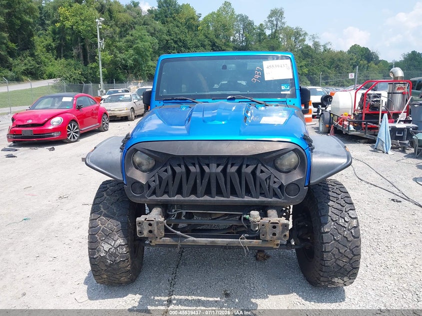 2014 Jeep Wrangler Unlimited Freedom Edition VIN: 1C4BJWDG5EL202774 Lot: 45539437