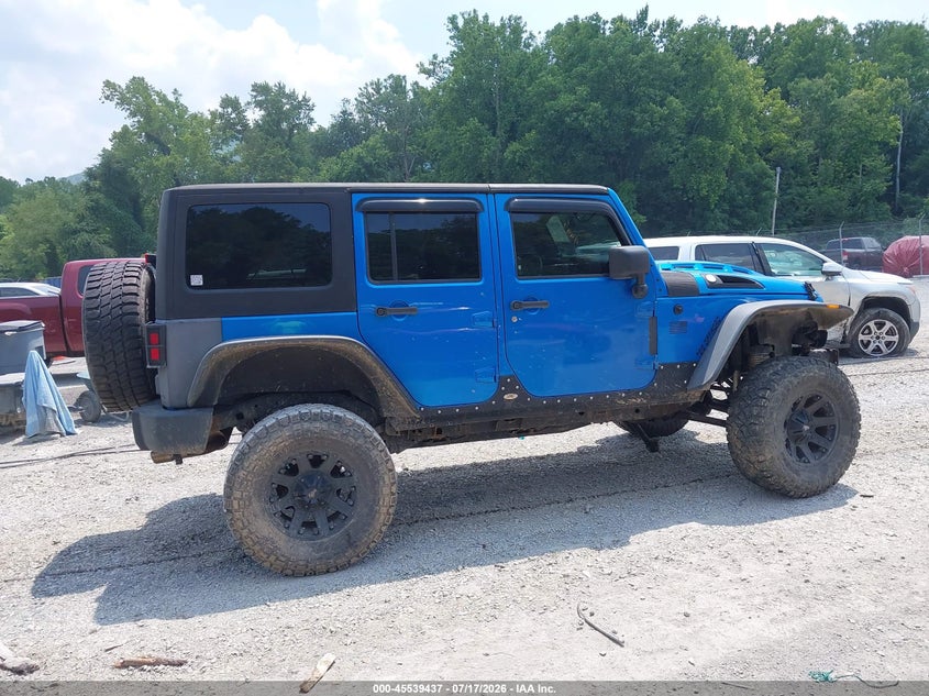 2014 Jeep Wrangler Unlimited Freedom Edition VIN: 1C4BJWDG5EL202774 Lot: 45539437