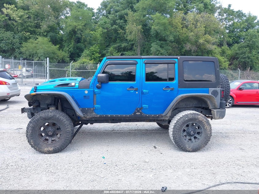2014 Jeep Wrangler Unlimited Freedom Edition VIN: 1C4BJWDG5EL202774 Lot: 45539437