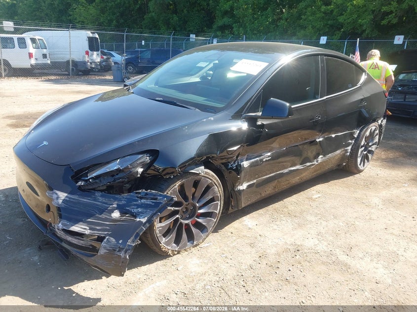2023 Tesla Model Y, Left Side, IAAI, VIN 7SAYGDEF1PF698720 — photo 2