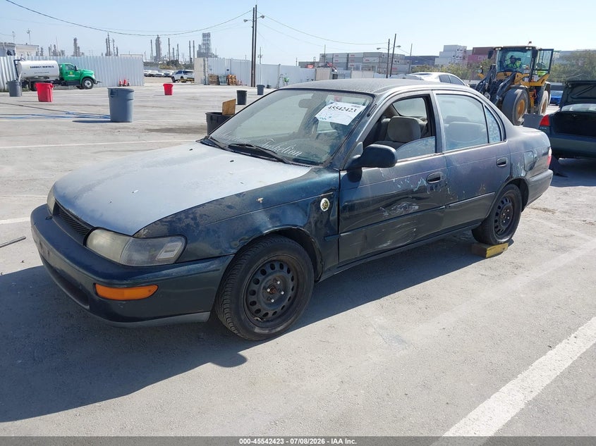 1996 Toyota Corolla, Левый бок, IAAI, VIN 2T1BB02E0TC169537 — фото 2