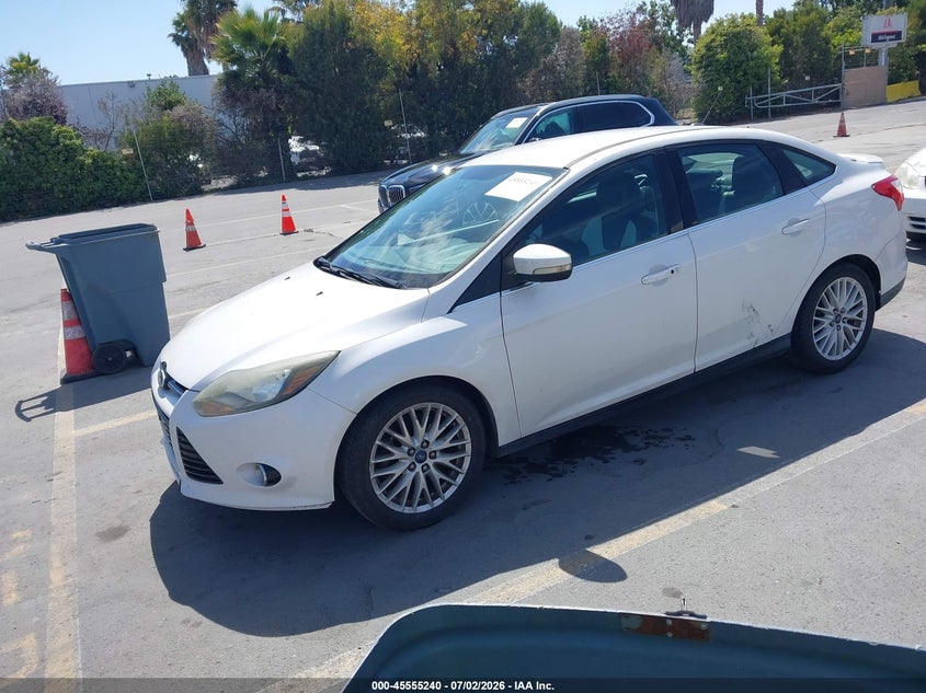 2013 Ford Focus Titanium 1FADP3J29DL235683 photo 1
