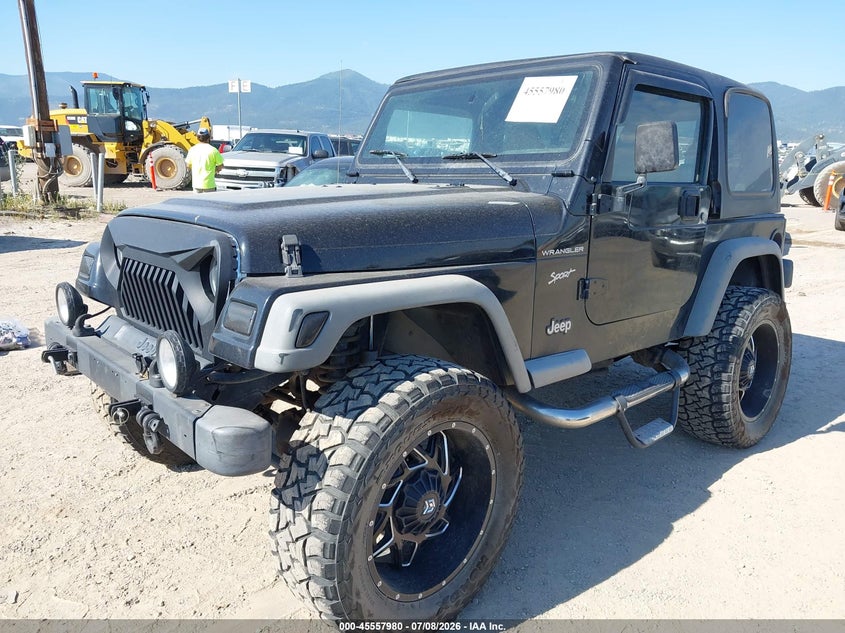 2002 Jeep Wrangler, Переворот, IAAI, VIN 1J4FA49S02P737884 — фото 2