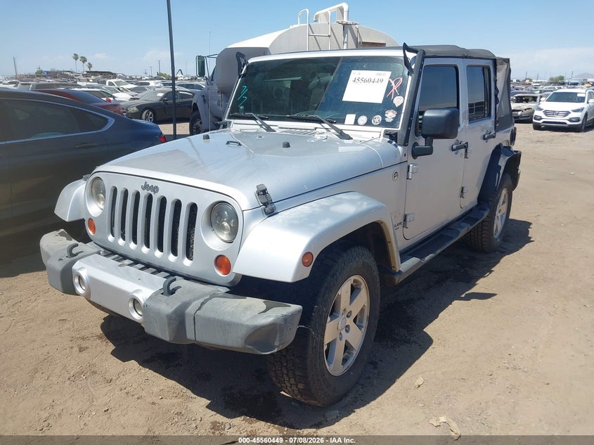 2008 Jeep Wrangler Unlimited Sahara 1J4GA59158L566938 photo 1