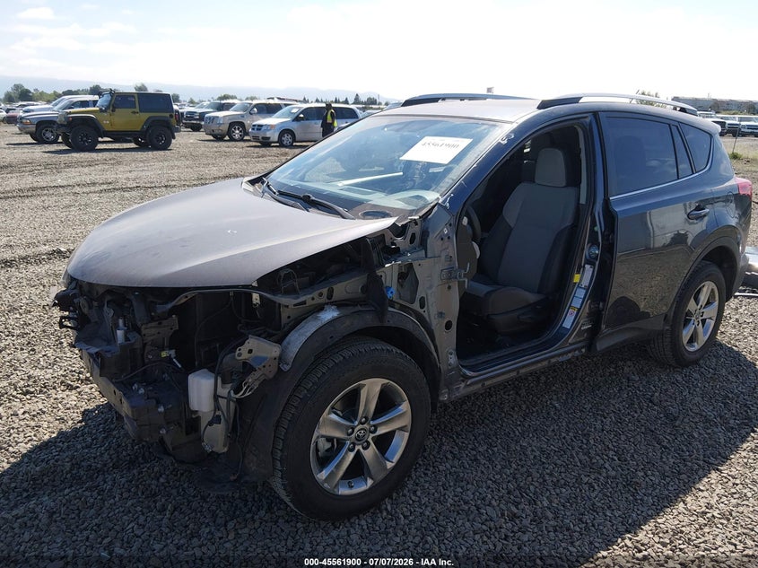 2015 Toyota RAV 4, Левый бок, IAAI, VIN JTMRFREV1FD117571 — фото 2