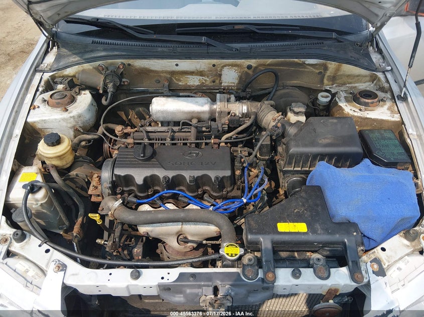 2002 Hyundai Accent L VIN: KMHCF35GX2U164933 Lot: 45563376