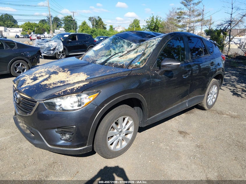 2016 Mazda CX-5, Storm Damage, IAAI, VIN JM3KE4CY5G0756105 — photo 2