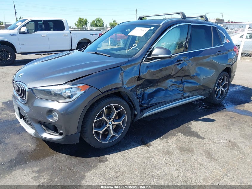 2018 BMW X1 xDrive28I VIN: WBXHT3C33J5F91906 Lot: 45573643