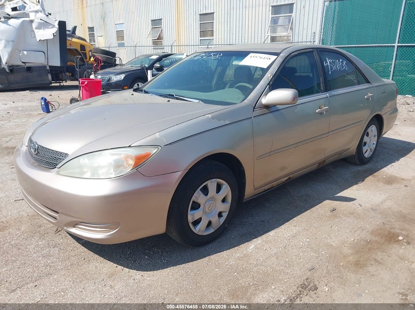 2002 Toyota Camry Le 4T1BE32K72U056891 photo 1