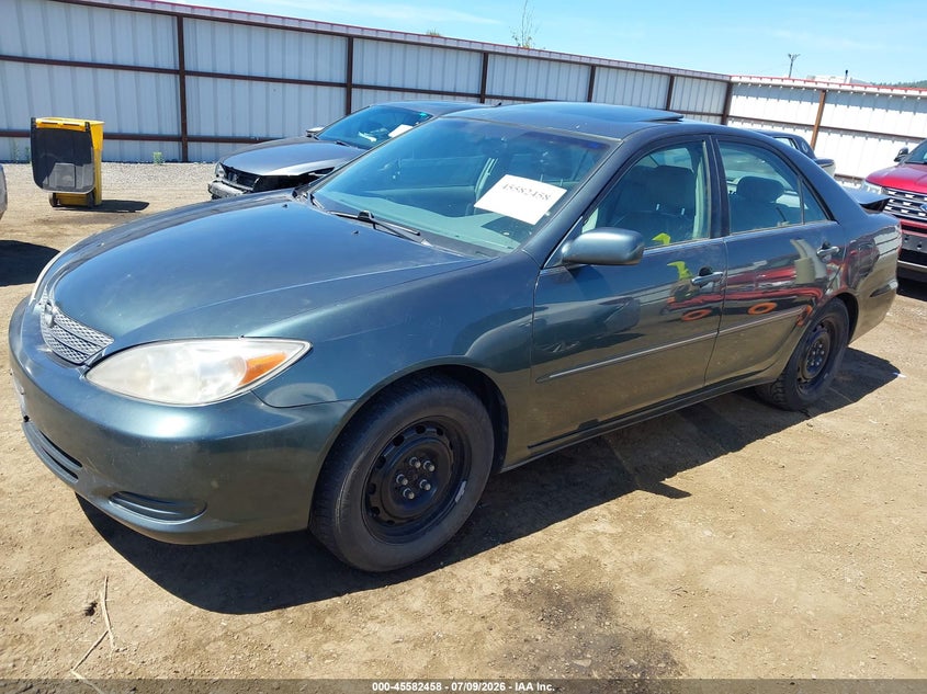 4T1BF30K62U521175 2002 Toyota Camry Xle photo 1