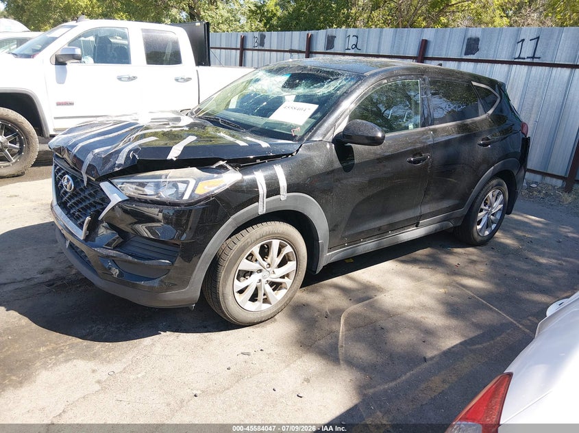 2019 Hyundai Tucson, Front & Rear, IAAI, VIN KM8J2CA40KU895739 — photo 2