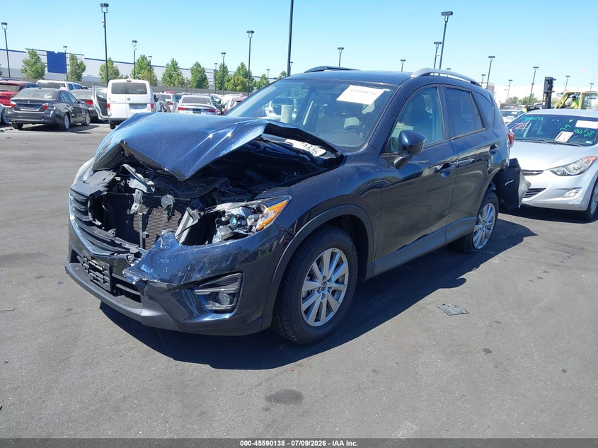 2016 Mazda CX-5, Перёд и зад, IAAI, VIN JM3KE2CY9G0808808 — фото 2