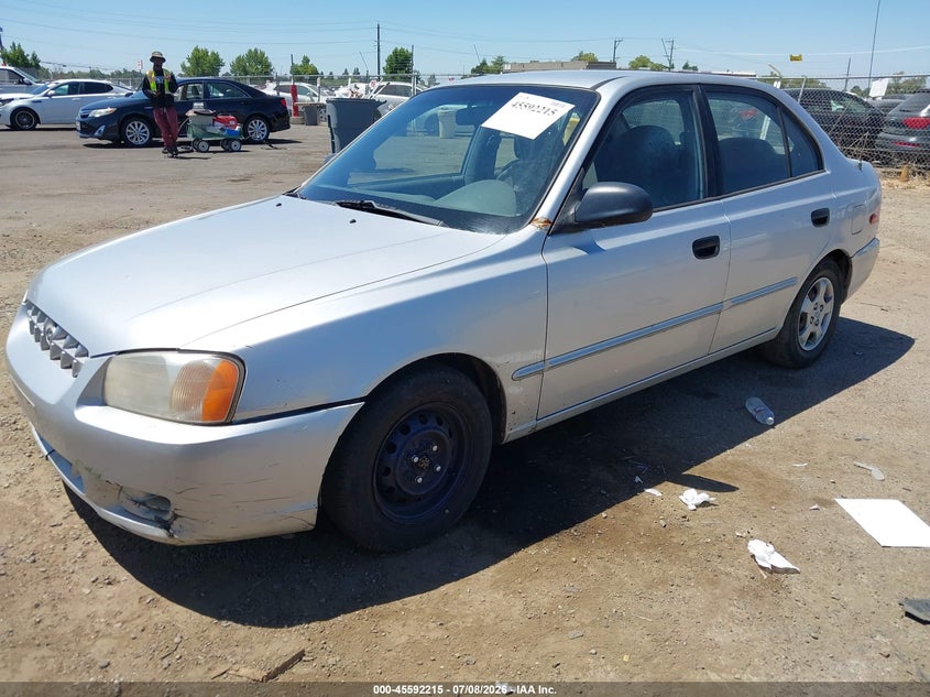 KMHCG45GXYU030144 2000 Hyundai Accent Gl photo 1