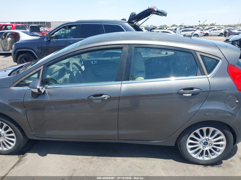 2015 Ford Fiesta Titanium VIN: 3FADP4FJ5FM110297 Lot: 45592497