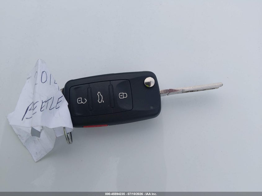 2014 Volkswagen Beetle 2.5L VIN: 3VWJP7AT1EM630953 Lot: 45594235