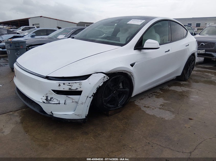 2026 Tesla Model Y, Left Side, IAAI, VIN 7SAYGDED8TA659791 — photo 2