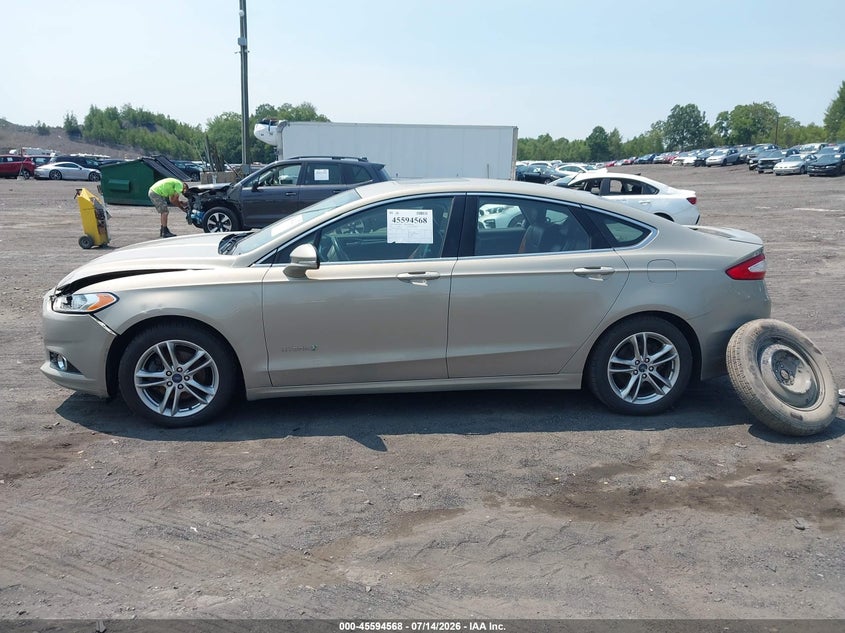 2016 Ford Fusion Hybrid Titanium VIN: 3FA6P0RUXGR131559 Lot: 45594568