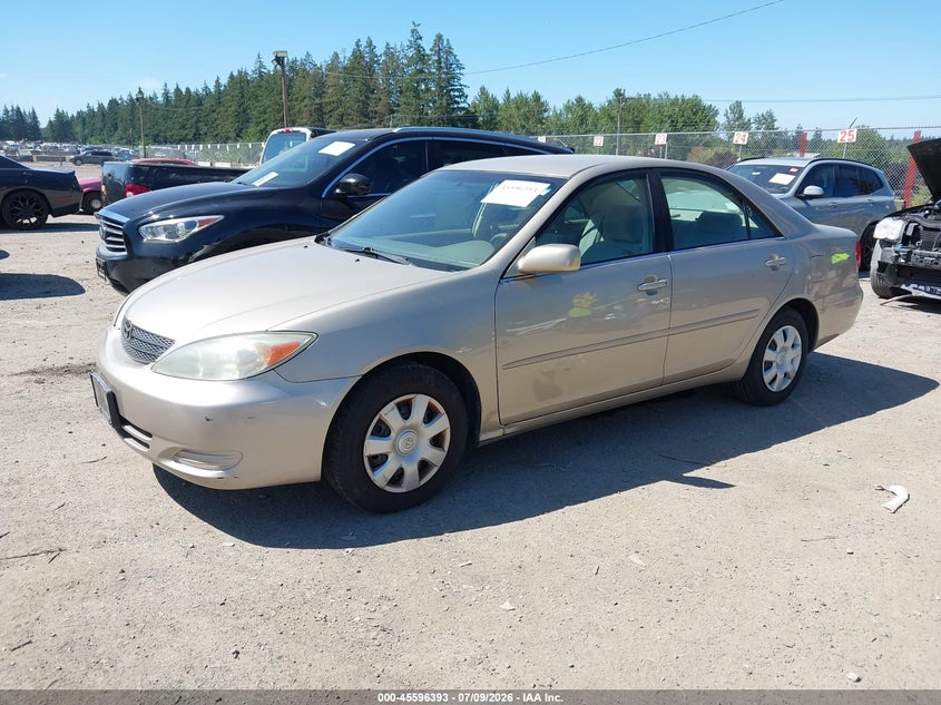 2003 Toyota Camry Le 4T1BE32K13U726498 photo 1