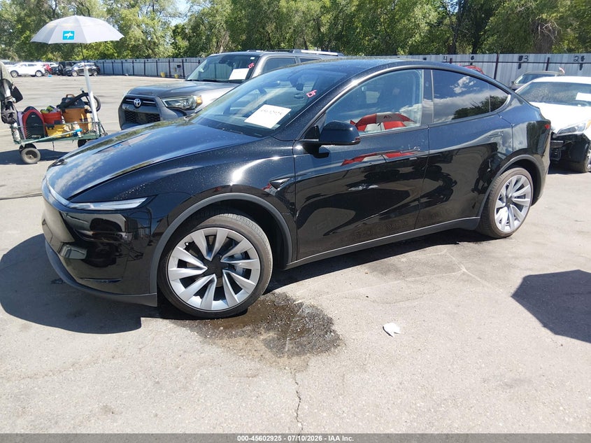 2026 Tesla Model Y, Right Side, IAAI, VIN 7SAYGDEE7TF346422 — photo 2