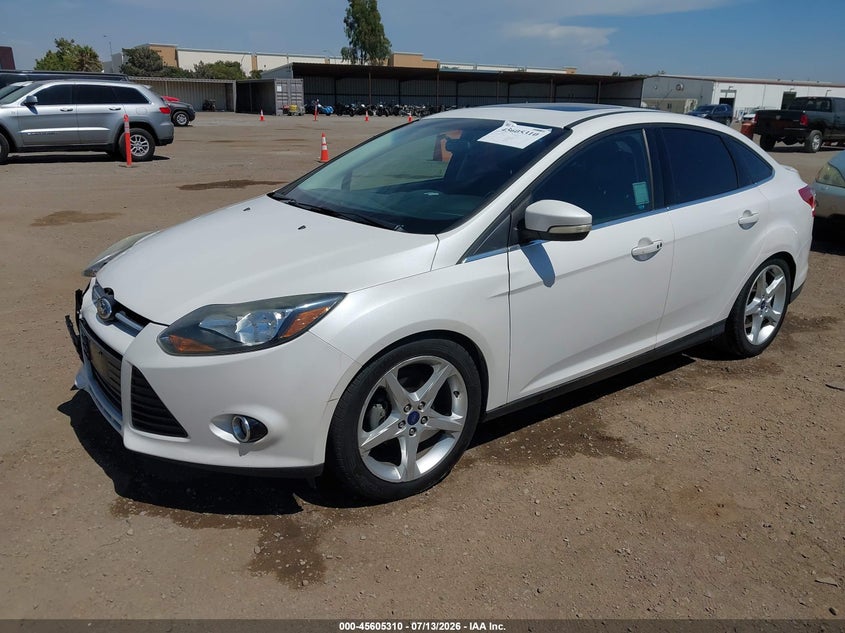 2014 Ford Focus Titanium 1FADP3J23EL131871 photo 1