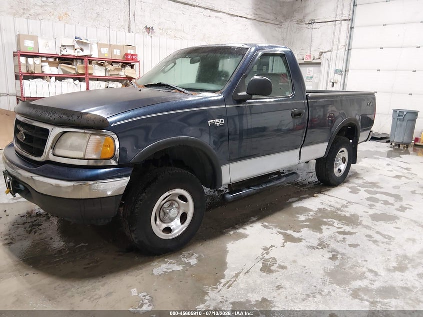 2003 Ford F-150, Normal Wear & Tear, IAAI, VIN 1FTRF18213NA33050 — photo 2